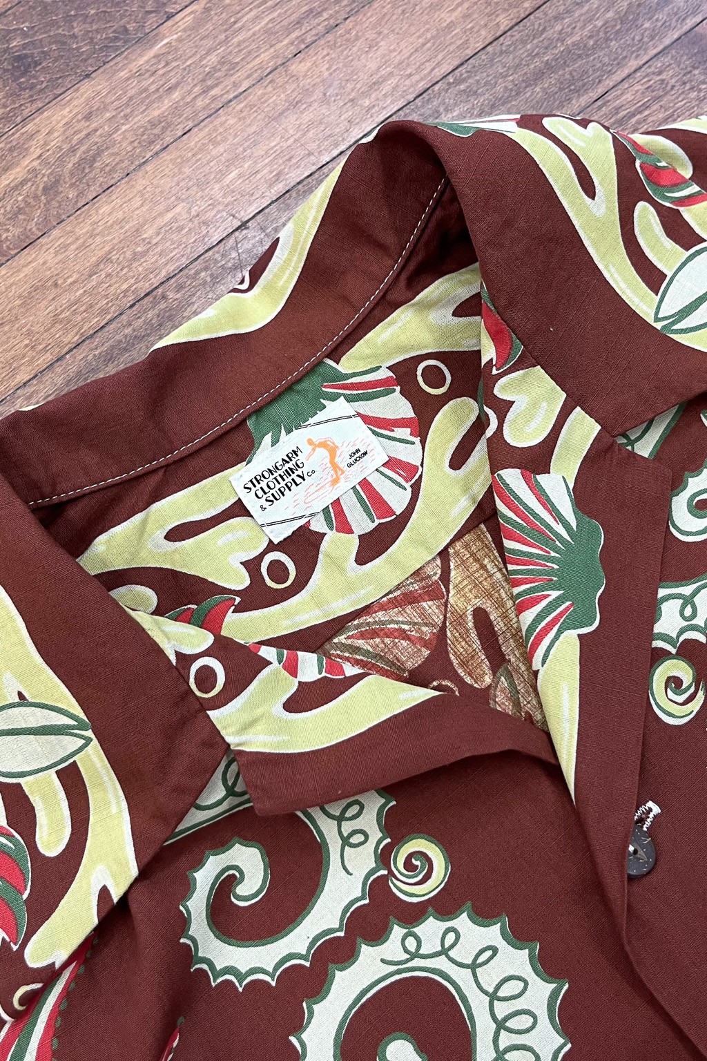 John Gluckow Seahorse Vs. Starfish Shirt Brown